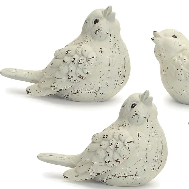 Set of Four Ivory Ceramic Bird Figurines