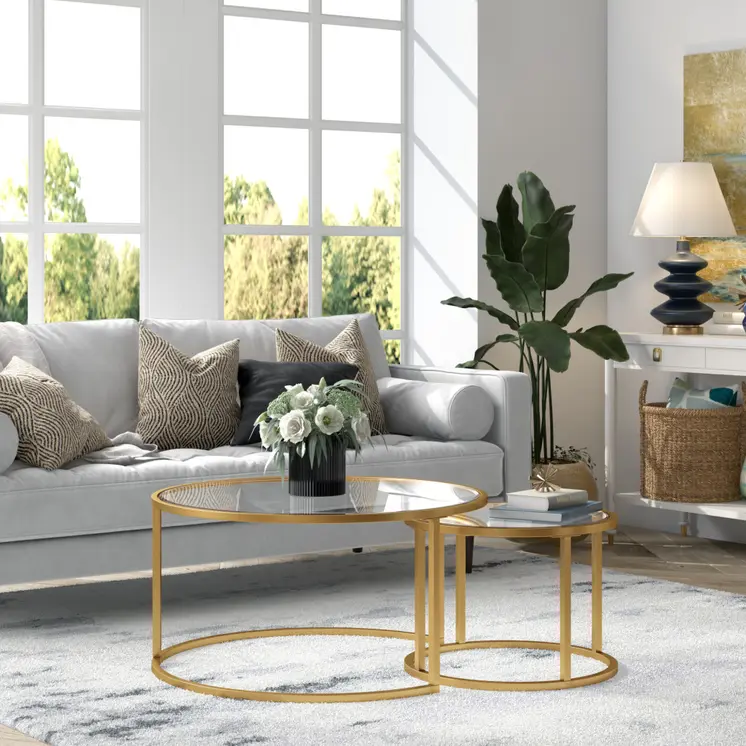 Set of Two 35" Gold Glass And Steel Round Nested Coffee Tables