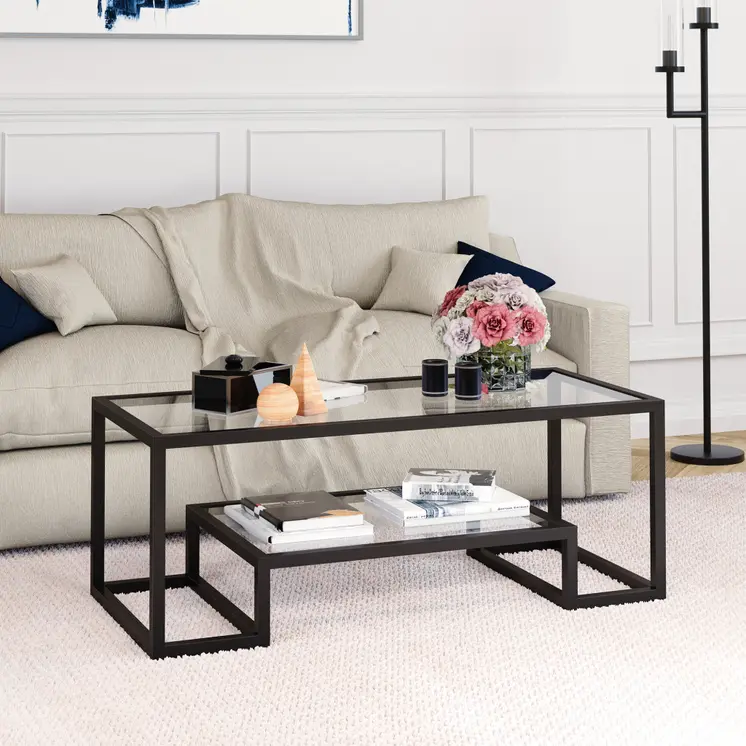 45" Clear And Black Glass And Steel Sled Coffee Table With Shelf