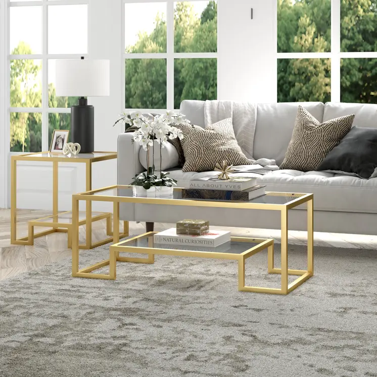 45" Clear And Gold Glass And Steel Sled Coffee Table With Shelf