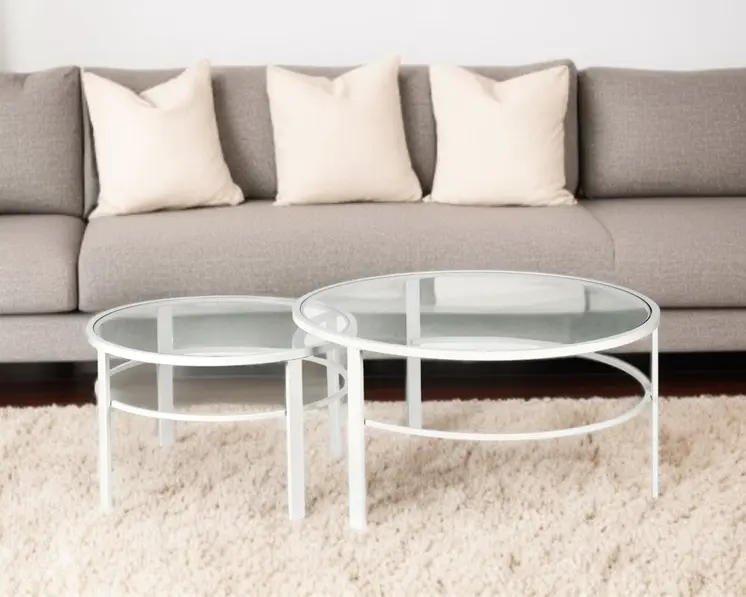 Set of Two 36" White Glass And Steel Round Nested Coffee Tables