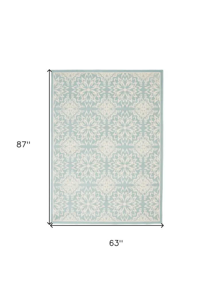 5' X 7' Blue and Ivory Floral Medallion Power Loom Area Rug