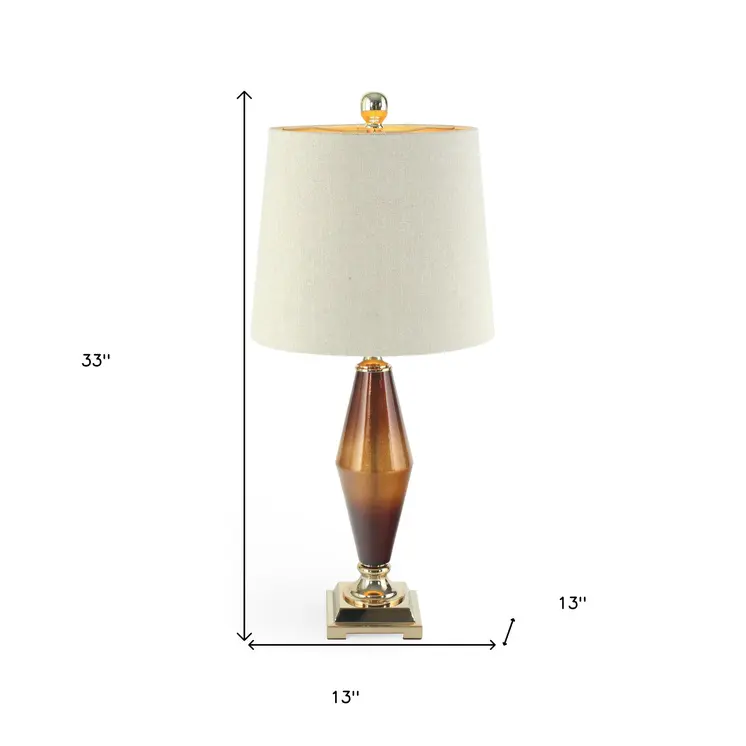 33" Gold and Brown Glass Table Lamp With Beige Cone Shade