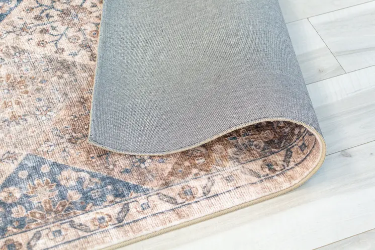 7' X 10' Brown and Blue Floral Distressed Area Rug