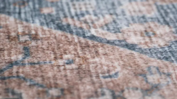 7' X 10' Brown and Blue Floral Distressed Area Rug