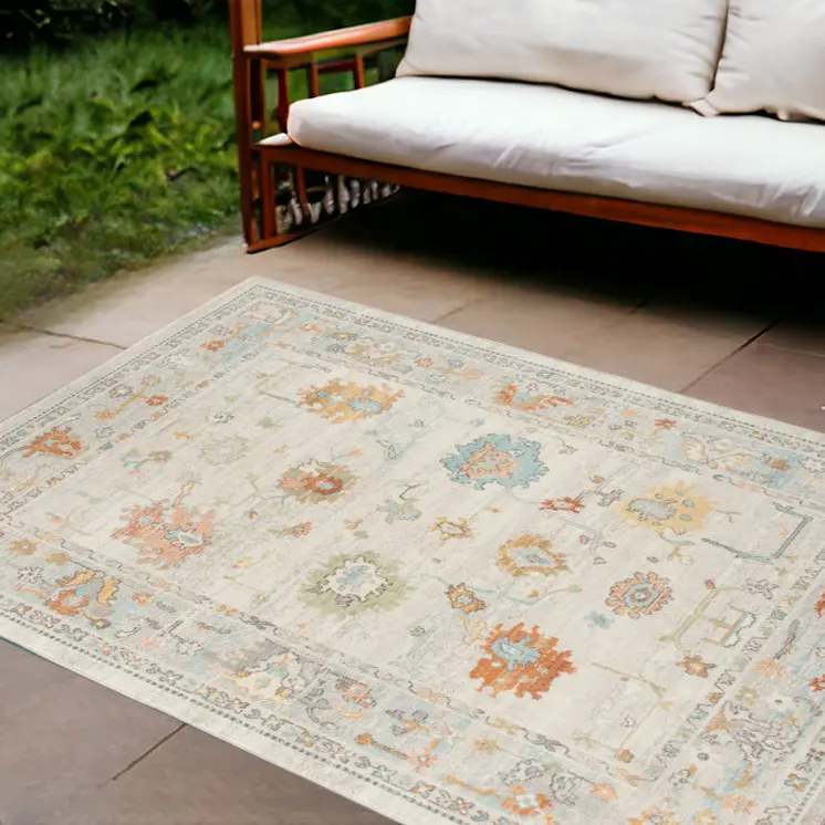 9' X 12' Blue and Orange Floral Stain Resistant Indoor Outdoor Area Rug