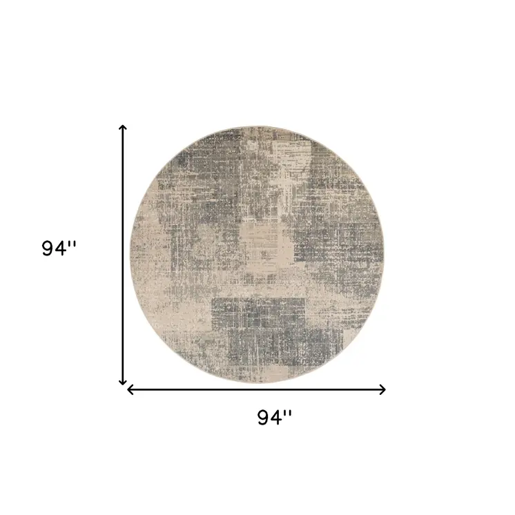 8' Gray and Light Blue Abstract Power Loom Round Rug