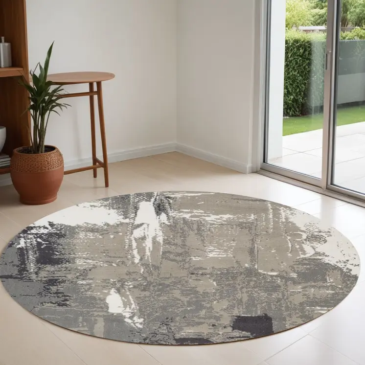 8' Ivory Black and Gray Abstract Power Loom Round Rug
