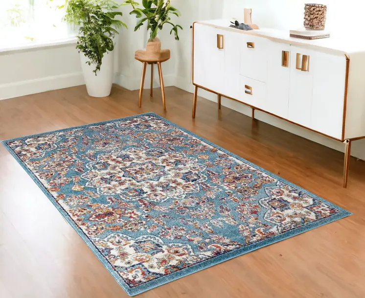 4' X 6' Ivory Blue and Orange Medallion Power Loom Area Rug