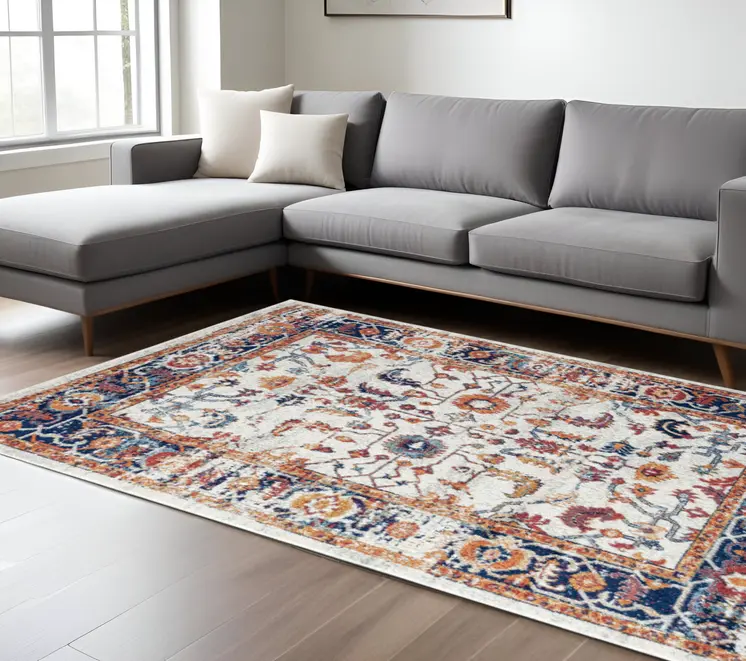 9' X 12' Ivory Navy and Orange Floral Power Loom Area Rug