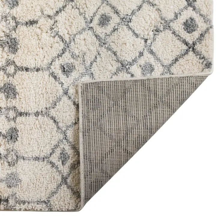 7' X 9' Gray And Ivory Geometric Shag Area Rug