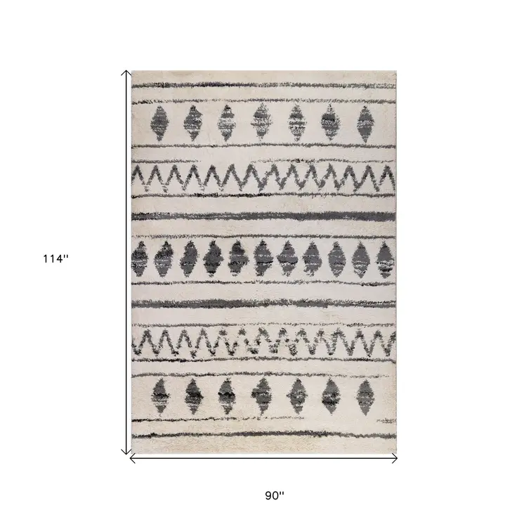 7' X 9' Black And Ivory Geometric Shag Area Rug