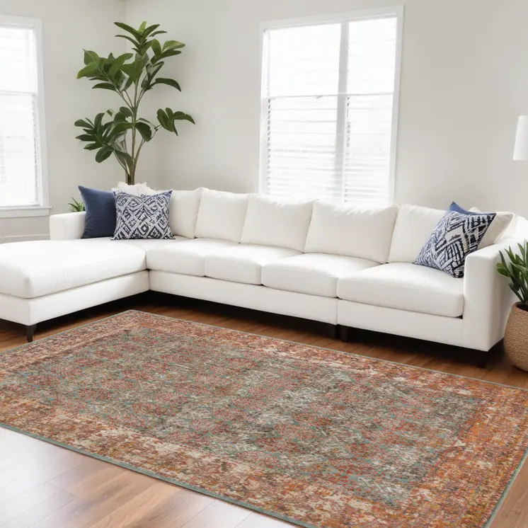 7' X 9' Teal And Orange Medallion Distressed Area Rug