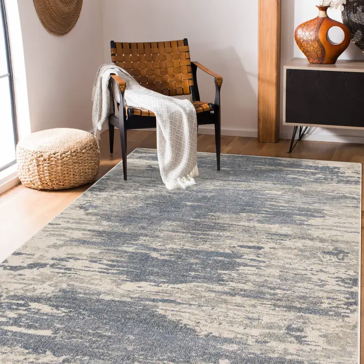 6' X 9' Ivory Blue And Gray Abstract Area Rug