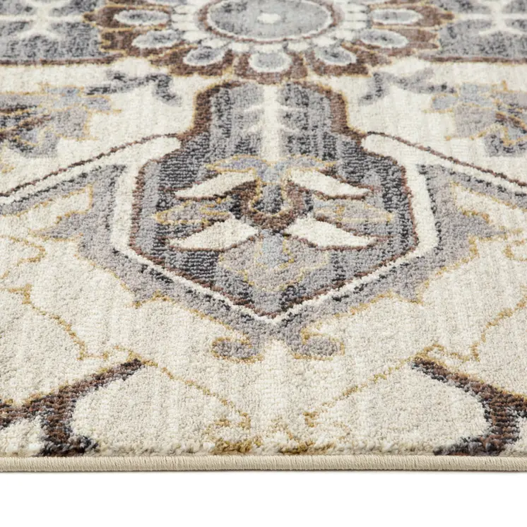 6' X 9' Ivory Gray and Black Floral Medallion Power Loom Area Rug