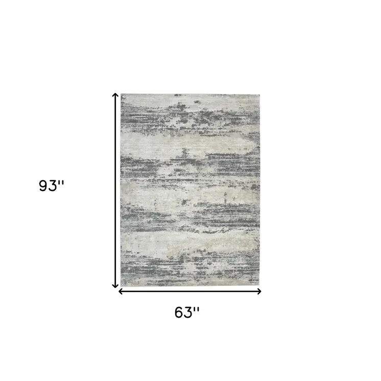 5' X 8' Ivory Beige And Gray Abstract Area Rug