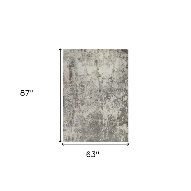 5' X 8' Beige Ivory And Gray Abstract Area Rug