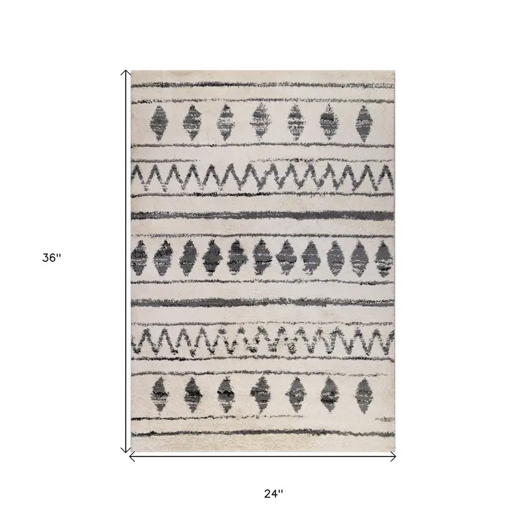 2' X 3' Cream Black And Gray Geometric Shag Area Rug