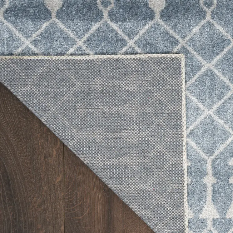 3' X 5' Blue and Ivory Abstract Power Loom Washable Area Rug