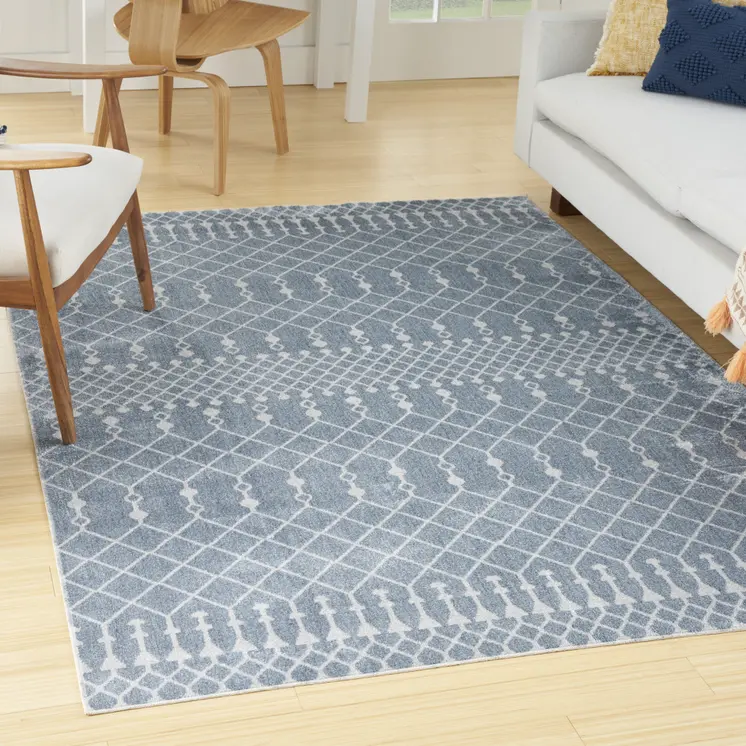 4' X 6' Blue and Ivory Abstract Power Loom Washable Area Rug