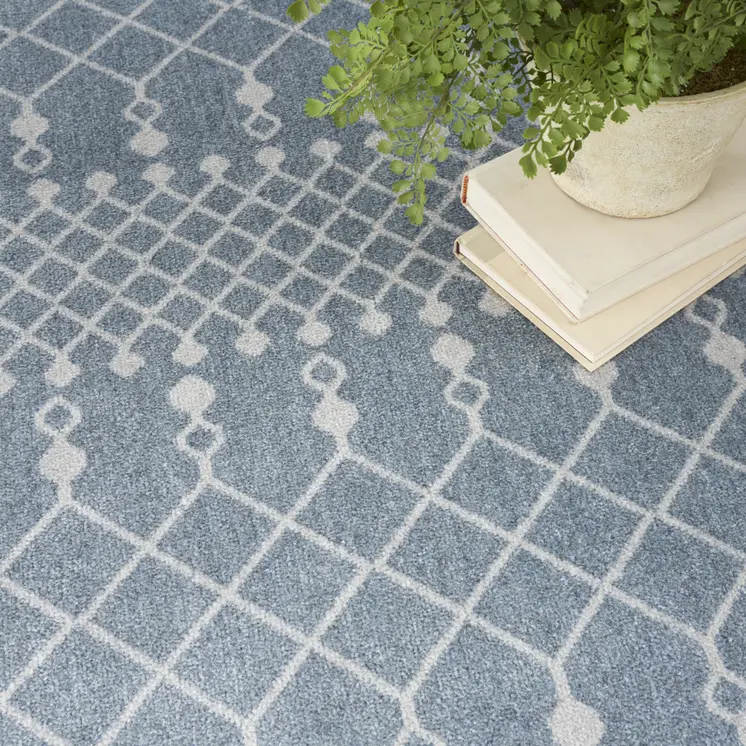 4' X 6' Blue and Ivory Abstract Power Loom Washable Area Rug