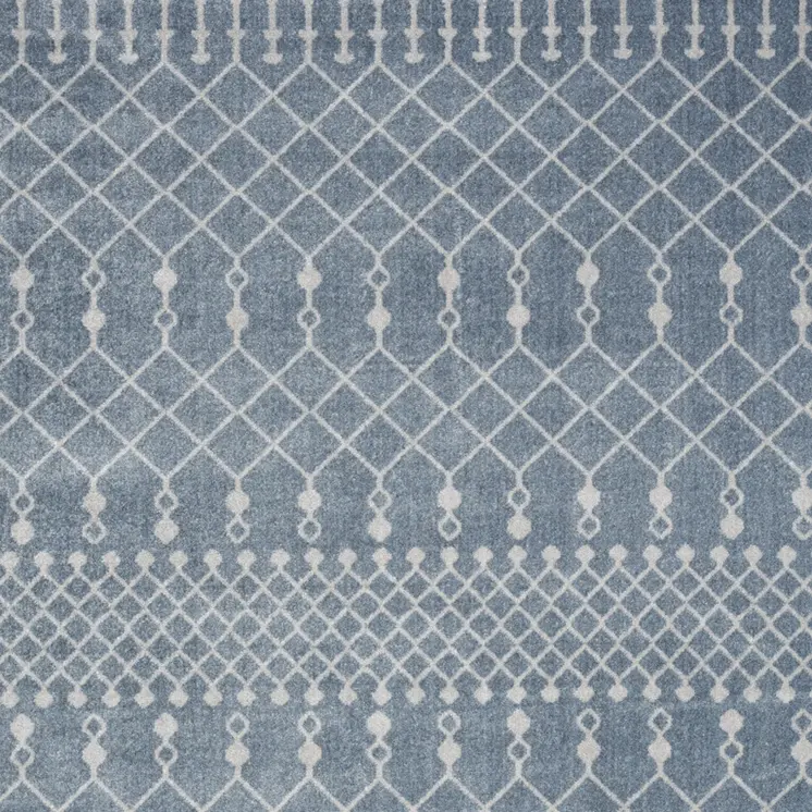 4' X 6' Blue and Ivory Abstract Power Loom Washable Area Rug