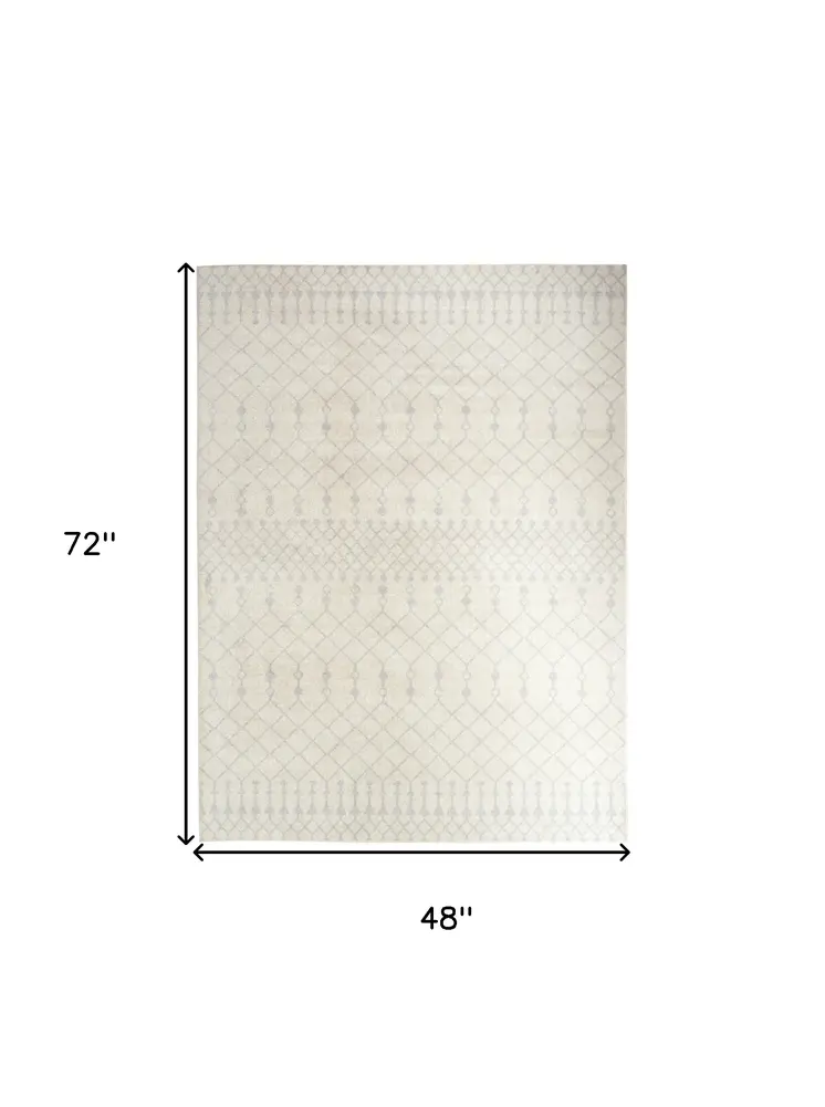 4' X 6' Blue and Ivory Abstract Power Loom Washable Area Rug
