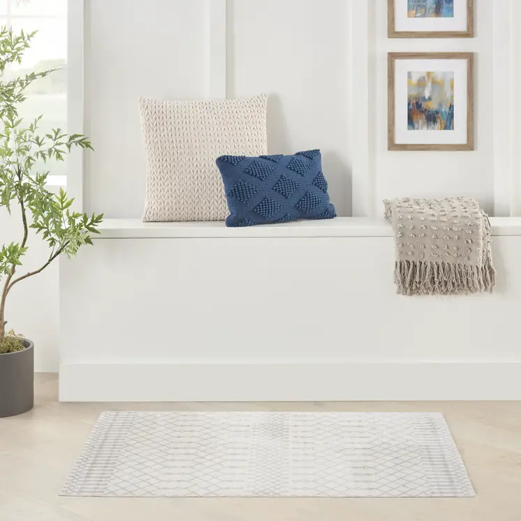 8' X 10' Blue and Ivory Abstract Power Loom Washable Area Rug