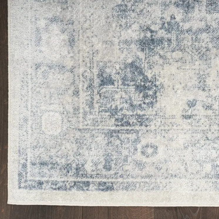 8' X 10' Blue and Ivory Abstract Power Loom Washable Area Rug