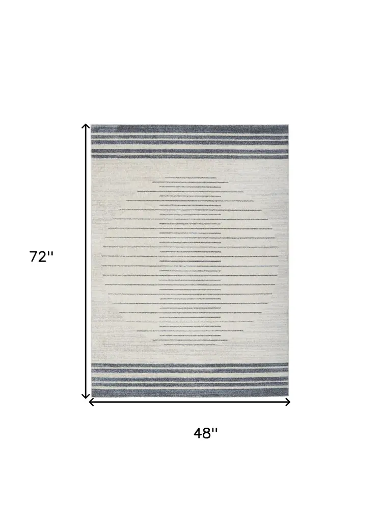 4' X 6' Ivory And Blue Geometric Washable Area Rug