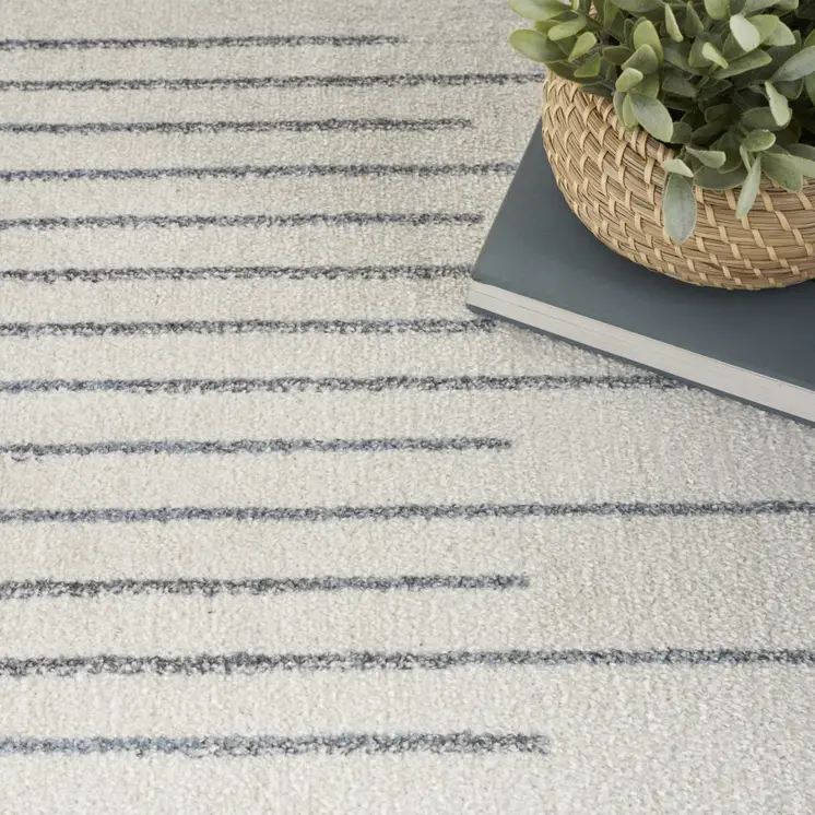 4' X 6' Ivory And Blue Geometric Washable Area Rug