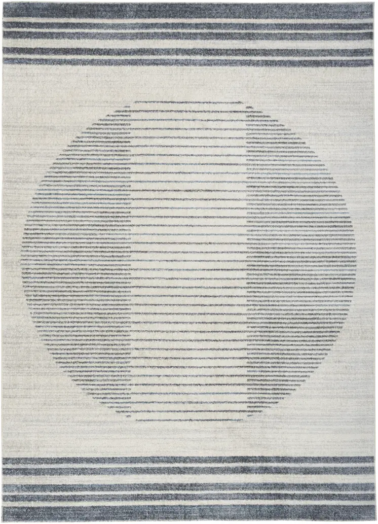 5' X 7' Blue And Ivory Geometric Washable Area Rug