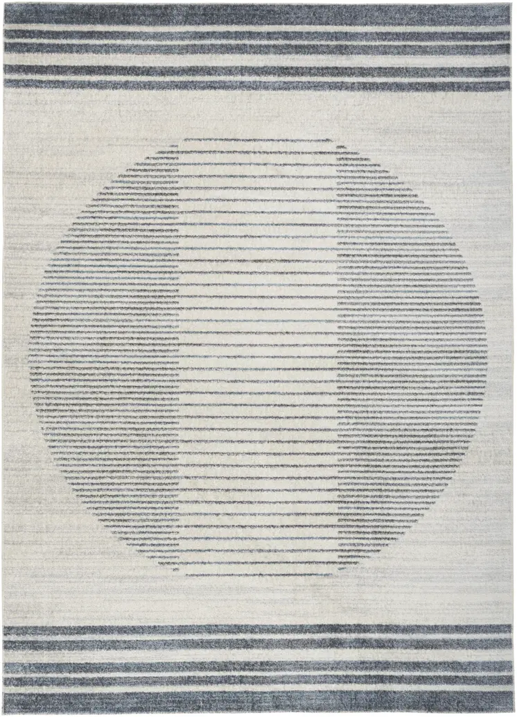 5' X 7' Blue And Ivory Geometric Washable Area Rug