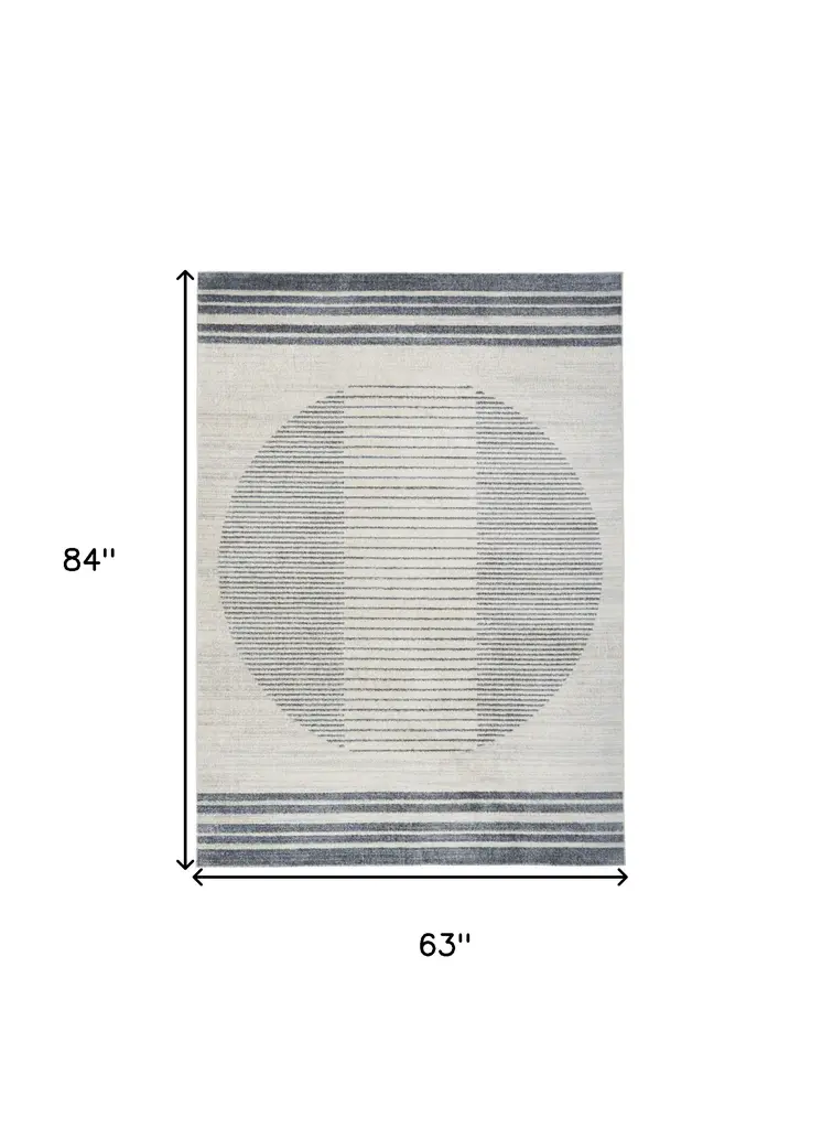 5' X 7' Blue And Ivory Geometric Washable Area Rug