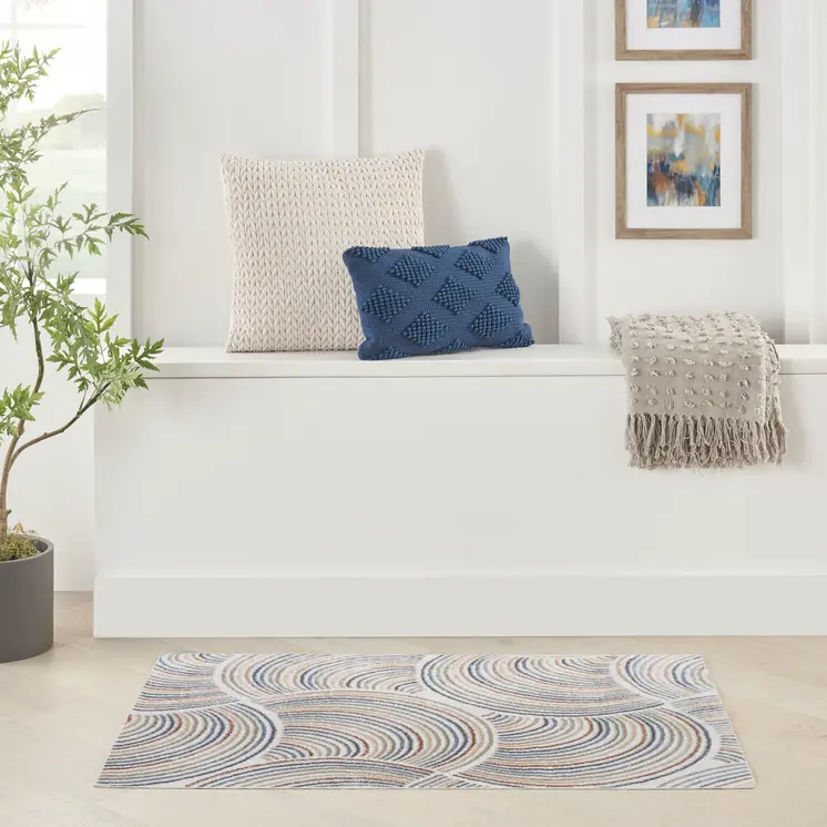 5' X 7' Blue and Ivory Geometric Power Loom Washable Area Rug