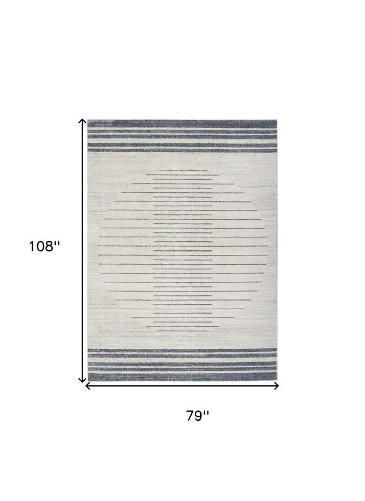 7' X 9' Blue And Ivory Geometric Washable Area Rug