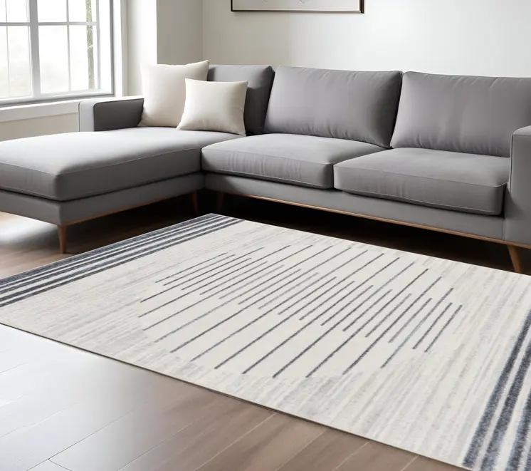 7' X 9' Blue And Ivory Geometric Washable Area Rug