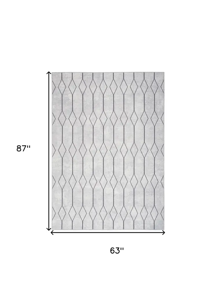 5' X 7' Gray and Ivory Geometric Power Loom Distressed Washable Area Rug