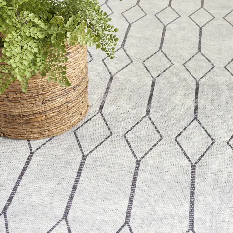 5' X 7' Gray and Ivory Geometric Power Loom Distressed Washable Area Rug