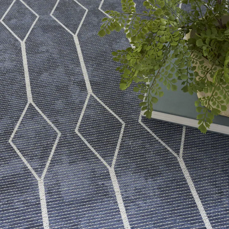 5' X 7' Blue and Ivory Geometric Power Loom Washable Area Rug