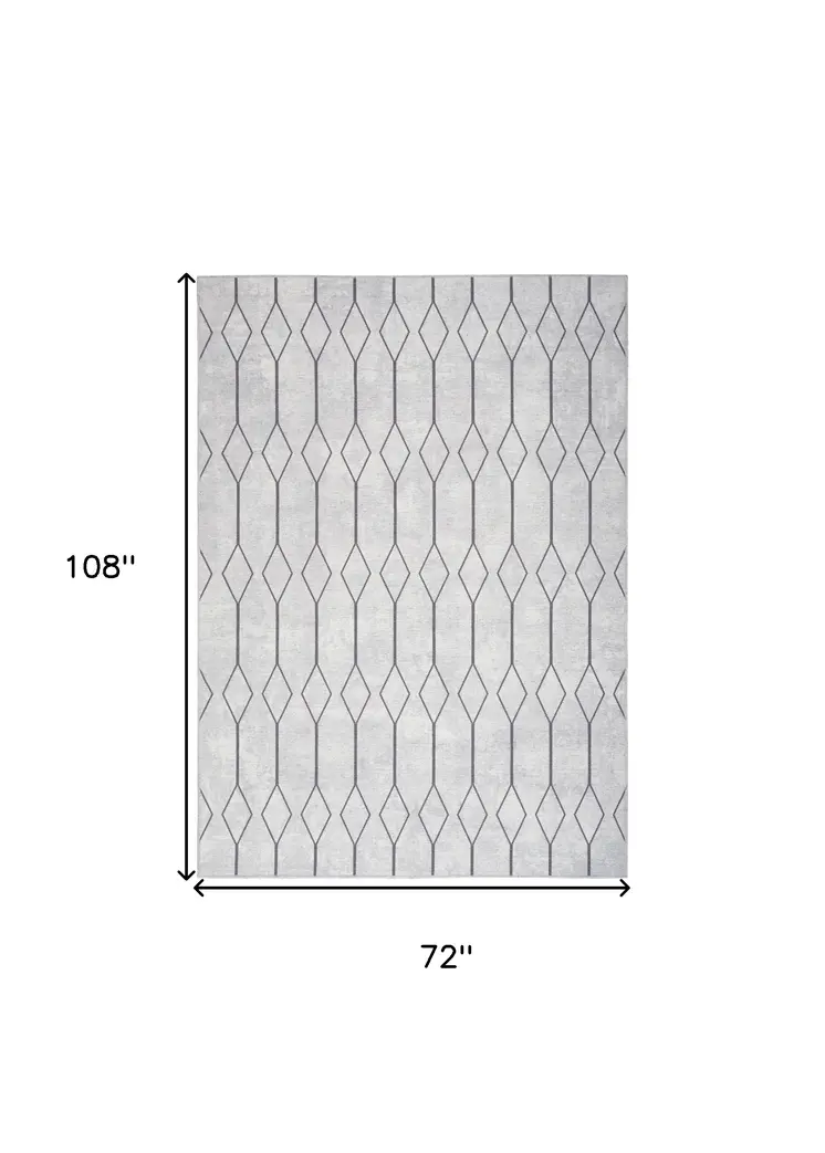 6' X 9' Gray and Ivory Geometric Power Loom Distressed Washable Area Rug