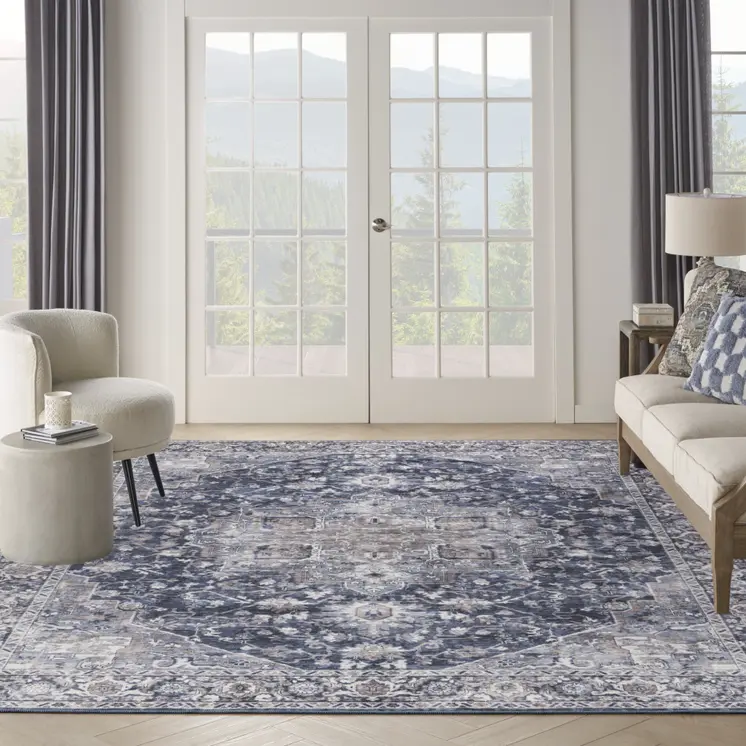 9' X 12' Blue and Ivory Floral Power Loom Distressed Washable Area Rug