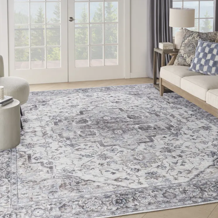 9' X 12' Beige and Ivory Floral Power Loom Distressed Washable Area Rug