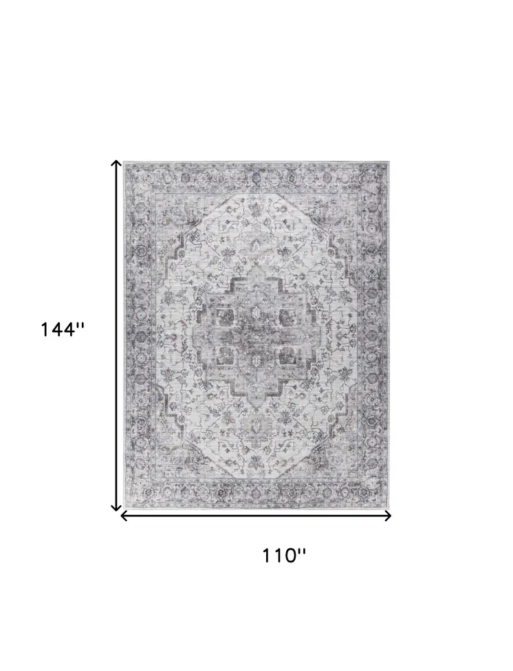 9' X 12' Beige and Ivory Floral Power Loom Distressed Washable Area Rug