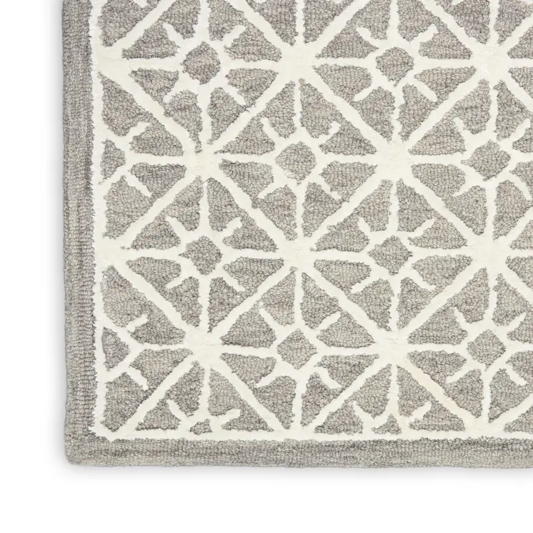 5' X 7' Gray and Ivory Geometric Hand Tufted Area Rug