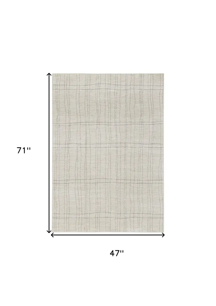 4' X 6' Gray and Ivory Abstract Power Loom Area Rug