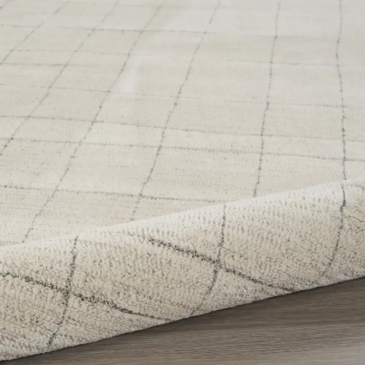 5' X 7' Gray And Ivory Abstract Area Rug