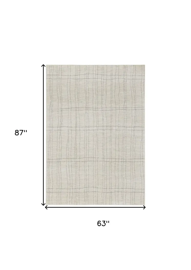 5' X 7' Gray And Ivory Abstract Area Rug