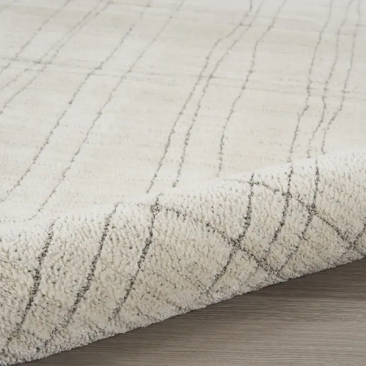 5' X 7' Gray And Ivory Abstract Area Rug