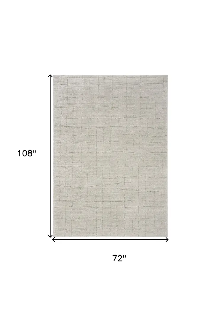 6' X 9' Beige And Gray Abstract Area Rug